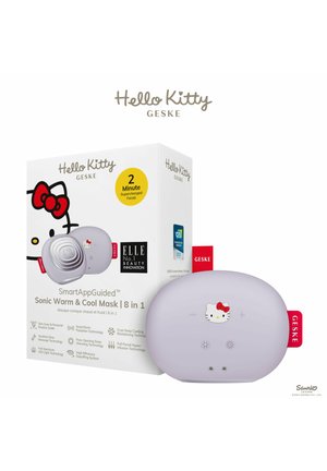 Masque réchauffant et rafraîchissant Hello Kitty Sonic en lavande, de forme ovale avec des boutons de contrôle, portant un graphisme Hello Kitty, conditionné dans une boîte colorée.