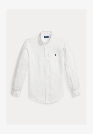 Chemise blanche à manches longues boutonnée, col boutonné et petit logo Polo Ralph Lauren bleu brodé sur la poitrine gauche.