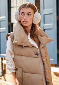 Next Panta/korvaläpät - cream