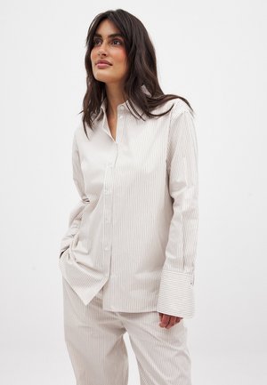 LÄSSIGES - Blus - beige stripe