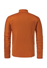 Langärmliges Hemd aus strukturiertem oranges Stoff. Verfügt über einen Stehkragen und eng anliegende Manschetten. Konturierte Nähte verbessern Passform und Design.