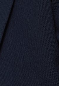 Navy blue knitted fabric with a textured surface, featuring a consistent pattern and soft, flexible material without visible embellishments.