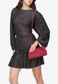 Miriade Borsa a mano - rosso