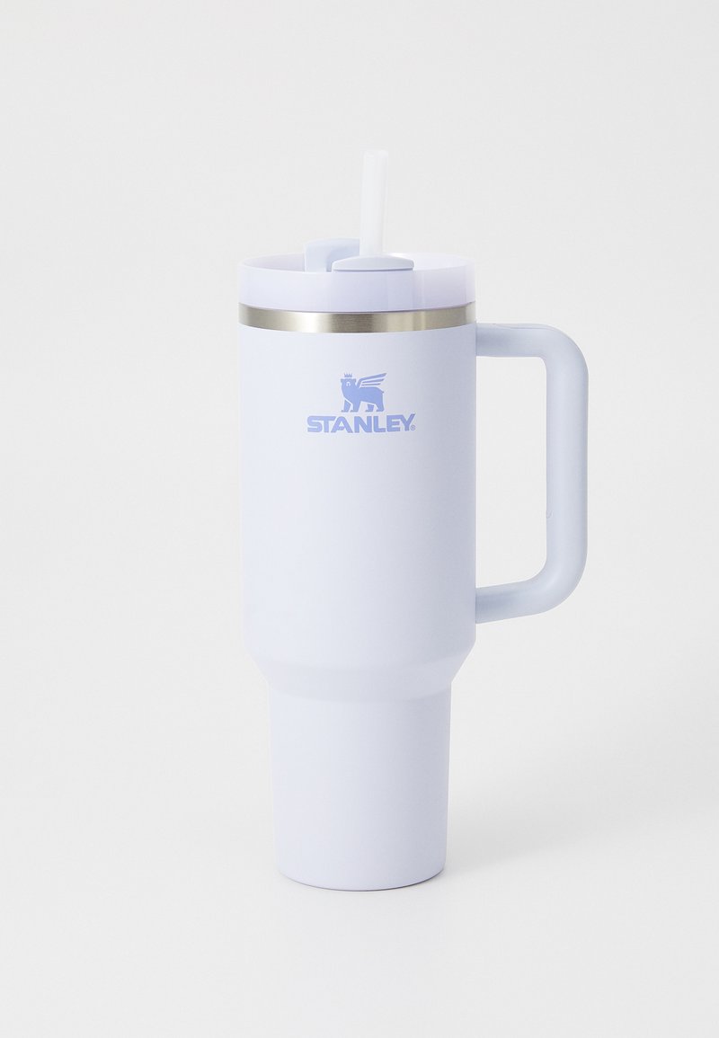 Insulated tumbler in light purple with a stainless steel band. Features a straw and a sturdy handle for easy grip. Logo displayed prominently.