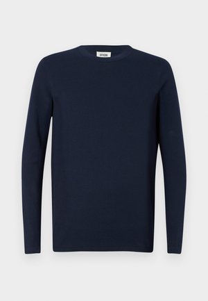 Tricou cu mânecă lungă de culoare bleumarin, realizat din bumbac moale. Are un guler rotund și un design simplu, fără modele sau accente.