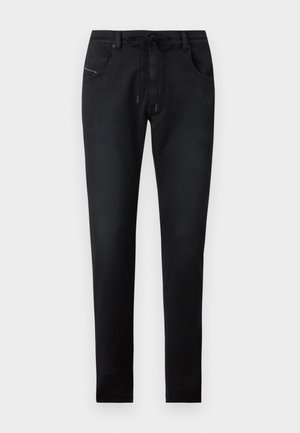 Čierne džínsové nohavice so slim fit strihom, s nastaviteľným pásom, dvoma prednými vreckami a jemnými detailmi prešitia. Hladká textúra.