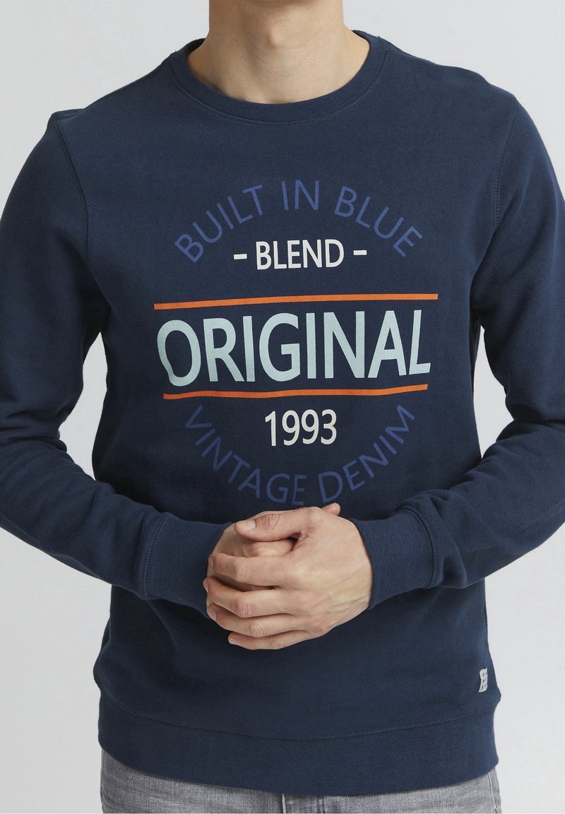Marineblauwe sweatshirt van katoen, met een opvallende grafische print met "Original" en "1993" aan de voorkant, geribbelde manchetten en zoom.