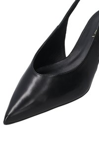 Black leather slingback high heels with a pointed toe, featuring a smooth texture and a cutout design on the sides. Elegant silhouette.