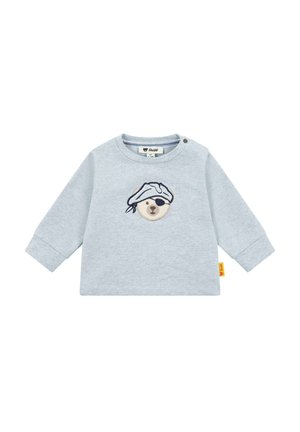 Camisa de manga larga gris claro con un rostro de oso bordado, con un sombrero de pirata y un parche en el ojo. Cierre a presión en el hombro. Tejido suave.