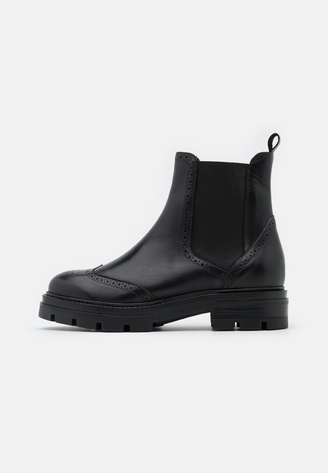 Bottines à plateau - noir