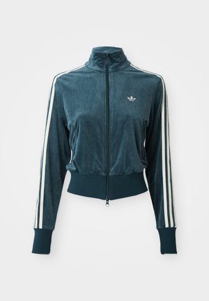 Teal ritsjack voor trainingen met geribbelde tailleband en manchetten, witte drie strepen langs de mouwen en een klein wit Adidas-logo op de borst.