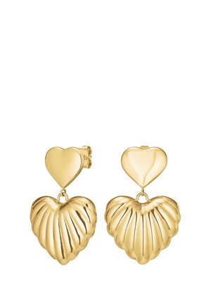 Boucles d'oreilles en forme de cœur en ton or avec un design texturé et ondulé. Présente un connecteur en cœur lisse en haut, créant un effet de superposition.