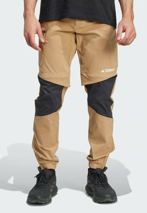 adidas Sportswear UTILITAS HIKING ZIP-OFF - Outdoor trousers - cardboard