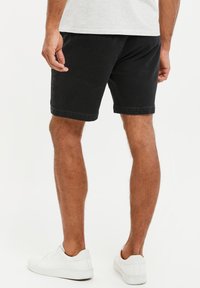 Threadbare THBPLAZA - Jeansshort - washed schwarz