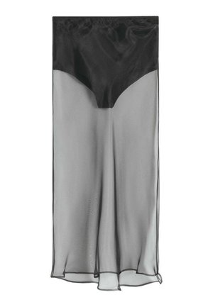 Longue jupe noire et grise transparente avec une bande taille haute noire unie et un tissu translucide fluide en dessous.
