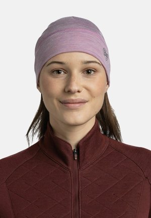 Soft, lightweight pink headband with a smooth texture, featuring a stitched seam and a small brand logo on the side.
