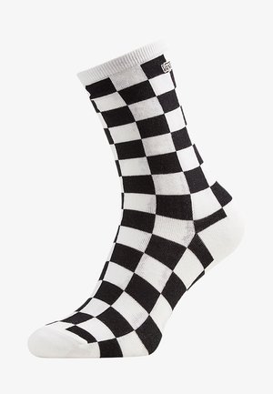 Schwarz-weiße karierte Socken mit geripptem Bündchen, knöchellang, aus einer Baumwollmischung, mit kleinem Vans-Logo.