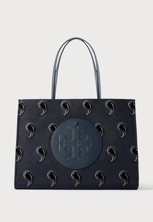 Navy tote bag met paisley-patronen en een groot reliëf rond logo in het midden, met dubbele handvatten.