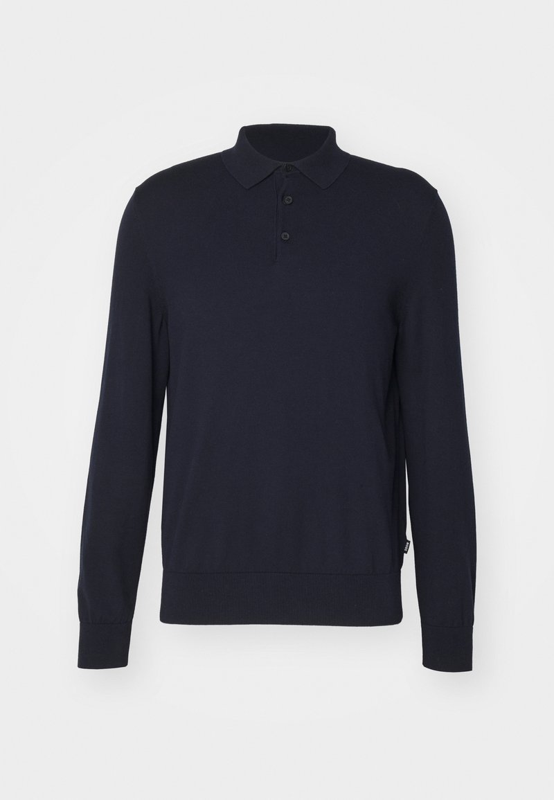 Polo bleu marine à manches longues avec trois boutons, poignets côtelés et ceinture sur fond blanc.