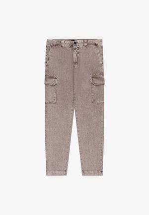 Beige zulaufende Cargohosen mit seitlichen Klappentaschen, vorderen schrägen Taschen, Gürtelschlaufen und Knopfverschluss.