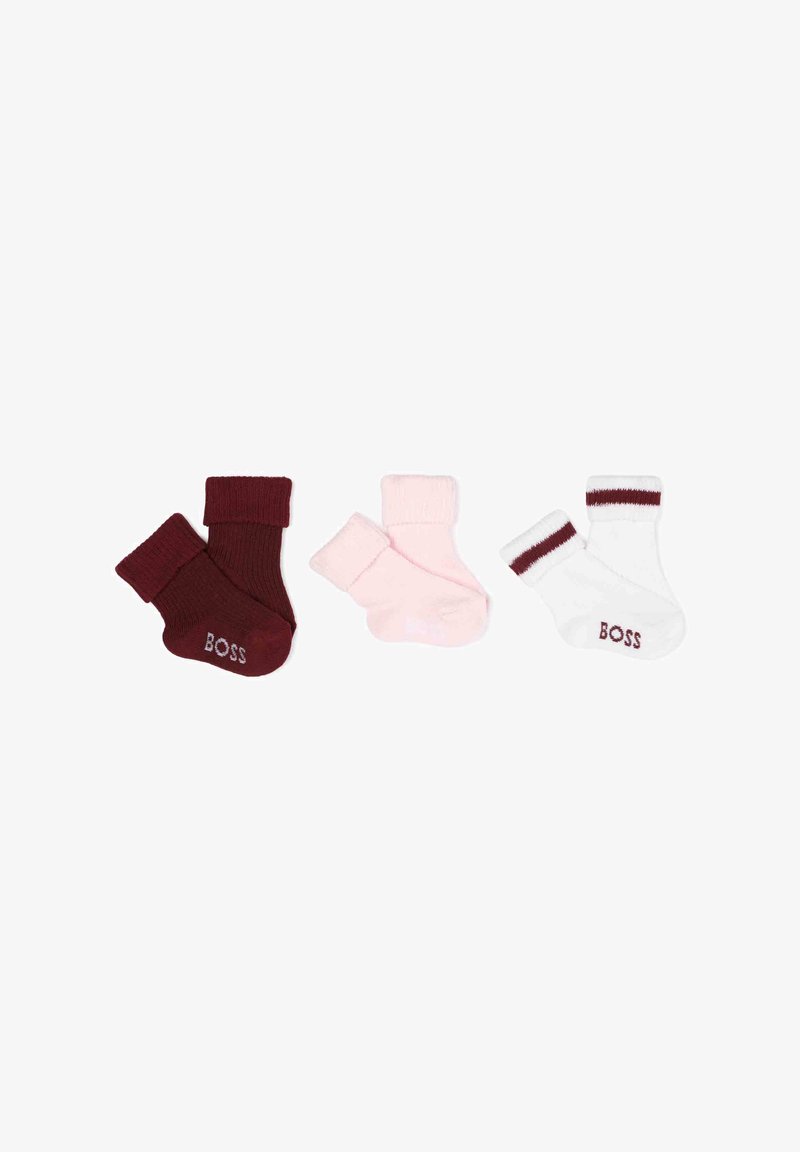 Ensemble de trois paires de chaussettes en coton : bordeaux, rose pâle et blanc. Chaque paire est dotée d'un revers côtelé ; logo "BOSS" sur le côté.