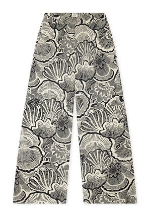 Bukser med vide ben, med et sort-hvidt mønster af muslingeskaller på en lys beige baggrund.