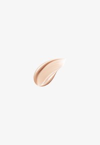 Échantillon de fond de teint crème beige clair sur fond blanc, montrant une texture lisse et un éclat subtil.