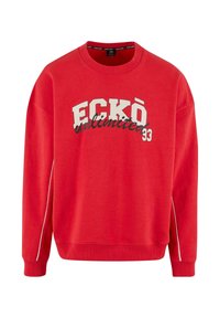 Felpa rossa con collo rotondo, maniche lunghe e polsini a coste. Presenta il testo "ECKŌ unlimited 93" in bianco e nero, con piping laterale.