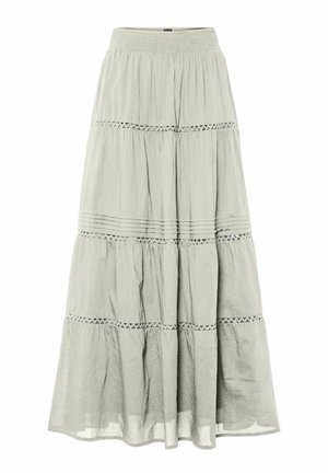 Ilgas, sluoksniuotas sijonas iš šviesiai pilkos medžiagos su minkšta tekstūra. Turi dekoratyvinį siuvimą, elastinę juosmenį ir laisvai krentančią formą.