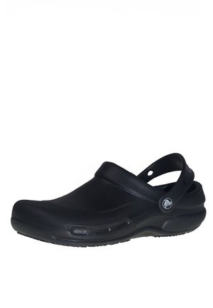 Black plastic clogs with a back strap, contoured design, rounded toe, and ventilation holes on the sides. Textured outsole for grip.