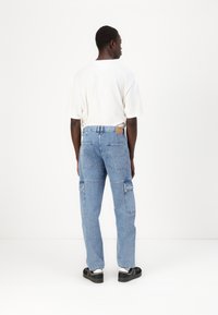 Tommy Jeans ISAAC UTILITY - Arbeidsjeans - denim medium