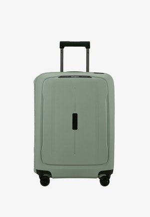 Hartschalenkoffer in Hellgrün mit strukturierter Oberfläche, ausziehbarem schwarzem Griff und vier schwarzen Rollen für optimale Beweglichkeit.