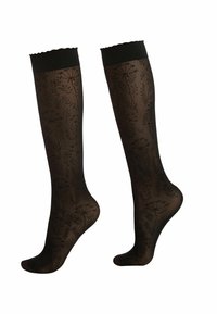 Svart knähög strumpor med blommig spetsdesign, vågig topp, genomskinlig textur och förstärkta tås- och hälpartier.