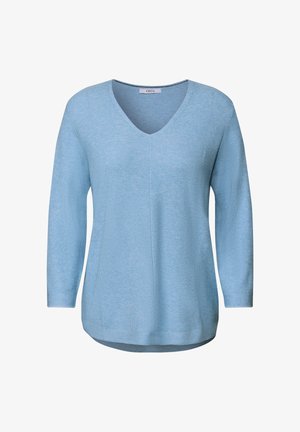 Pull léger bleu clair, à coupe ample, avec un col en V, des manches longues, un tricot texturé et un ourlet arrondi. Étiquette indique "CECIL." Design simple et décontracté.
