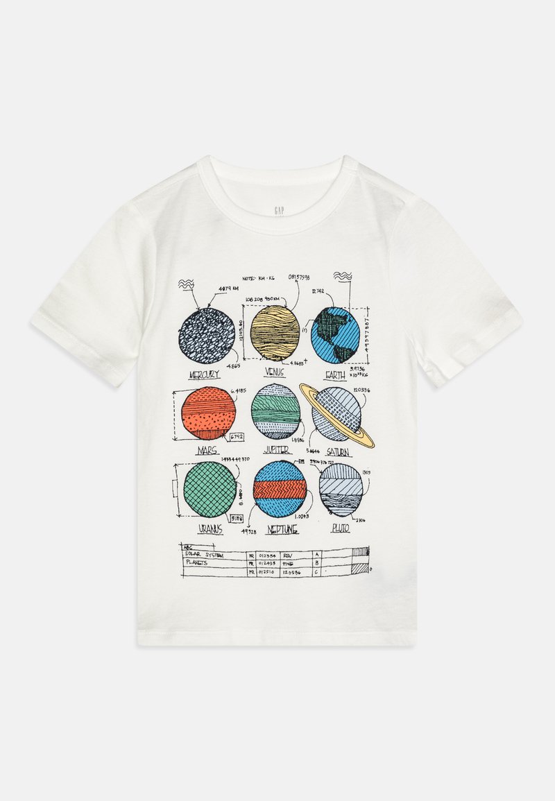 T-shirt en coton blanc avec un imprimé coloré de planètes disposées en grille, avec les noms et les mesures en dessous de chaque illustration.