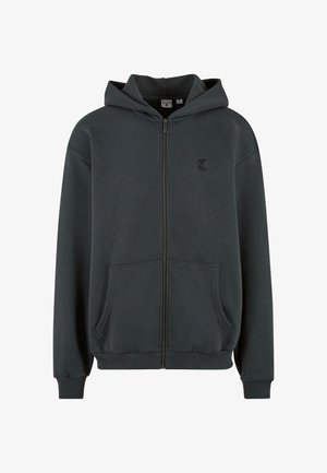 Dark gray zip-up hoodie with a front pocket and ribbed cuffs. Features a logo on the left chest area. Made of soft, comfortable fabric.