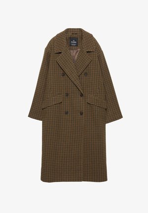 Rjav karirast dvojen plašč s širokimi reverji, dvema sprednjima žepoma in sproščenim prilegom. Gladko notranje podlogo, izdelano iz teksturirane tkanine.