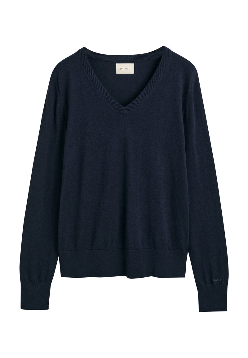 Marineblauer V-Ausschnitt-Pullover mit langen Ärmeln, gerippten Bündchen und Saum, aus weichem Material gefertigt. Mit Markenetikett am Ausschnitt.