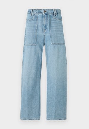Jeans de ganga azul claro com uma cintura alta, pernas largas e dois grandes bolsos frontais. O tecido apresenta uma textura suave e um desvanecimento subtil.