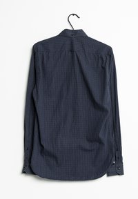 Mörkblå långärmad skjorta som hänger, med ett rutigt mönster, knappkrage och knappar i ärmsluten. Slät tyg med en avslappnad passform.