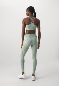 ICANIWILL DEFINE SEAMLESS TIE DYE - Leggings - light sea green