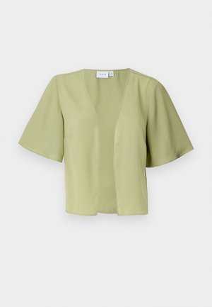 Maglietta a maniche corte di colore verde chiaro con scollatura a V e frontale aperto. Realizzata in un tessuto liscio con una vestibilità comoda e senza chiusure.