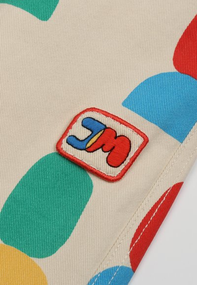 JELLY MALLOW SHAPE PANTS UNISEX - Avar lõikega teksad - ivory