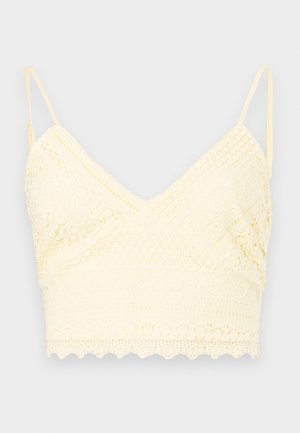 Yellow lace bralette with a v-neck design, adjustable straps, textured patterns, and a scalloped hem.