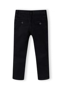 Mustad slim-fit püksid nööpidega tagataskutega, vöökohaga ja puhta, klassikalise disainiga, esitatuna tagantpoolt valge tausta ees.