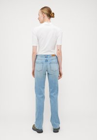 ONLY Tall ONLBLUSH MID - Straight leg jeans - light blue denim