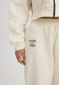 Misaga AYR - Trainingsbroek - off white
