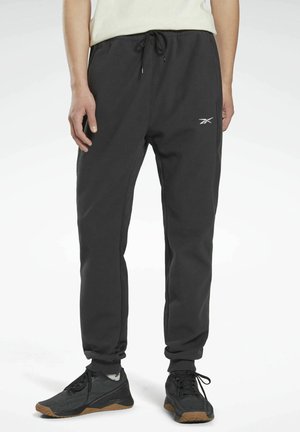 WORKOUT READY THERMOWARM - Tracksuit bottoms - black