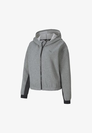 Sweat à capuche zippé gris clair avec fermeture éclair noire et poignets noirs, panneaux latéraux noirs et petit logo Puma sur la poitrine gauche.