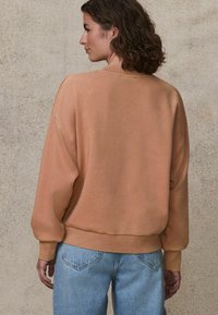 Next LICENCE JOHNNY CASH OFFICIAL GRAPHIC WASHED SLOGAN  - Mikina - pink coral